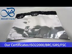 Srebrna, zamykana z trzech stron torebka z przezroczystym okienkiem